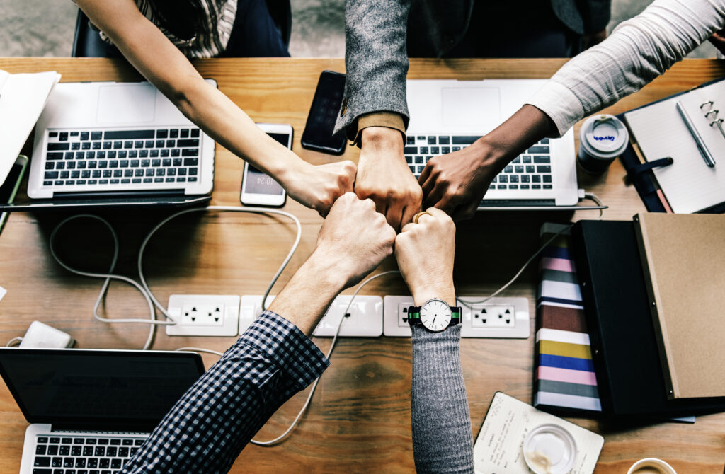 colleagues fist bump